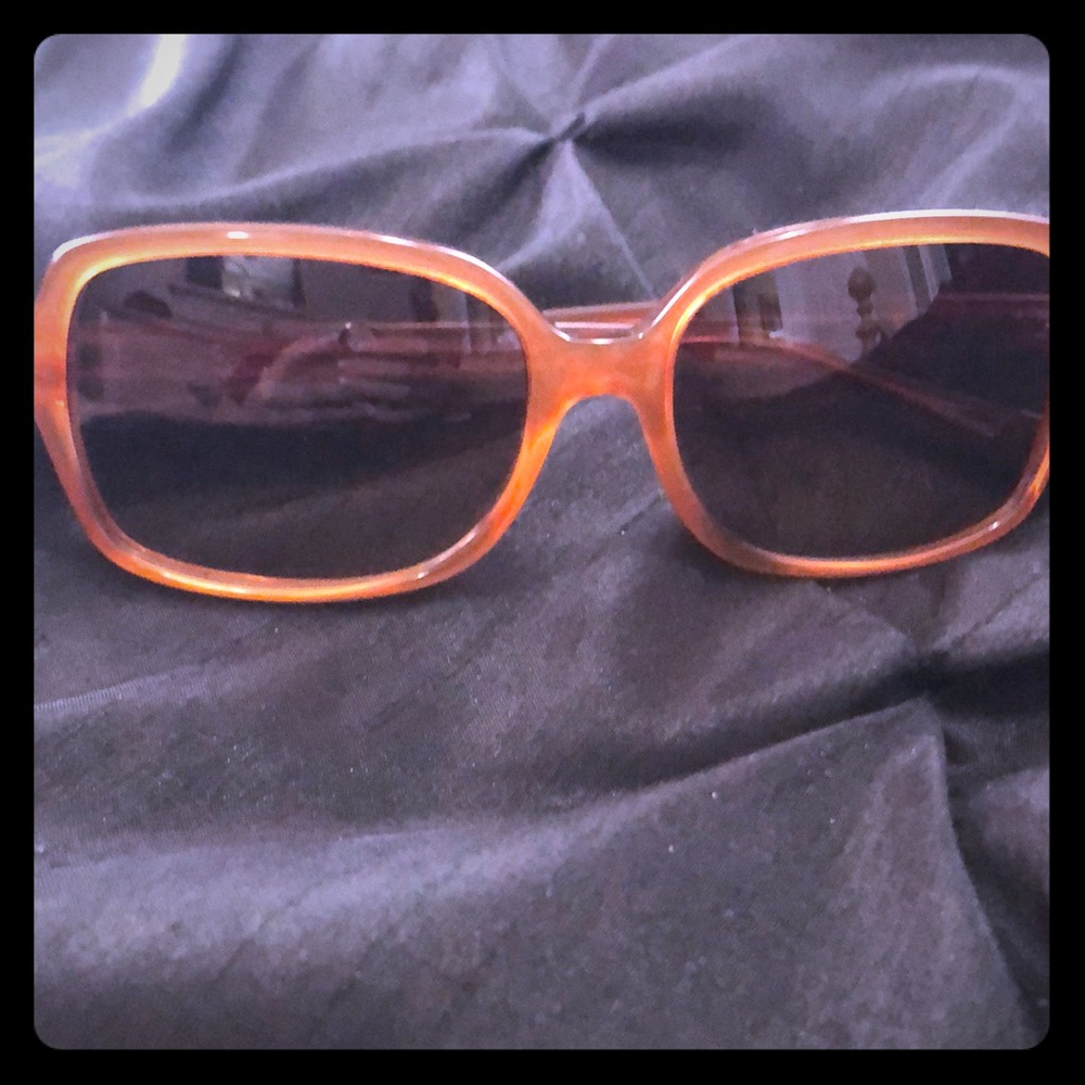 Like new caramel color Coach sunglasses.